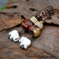 Carved Elephant and Mala Bead
